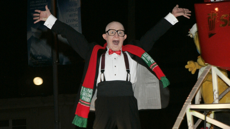 Mr. Six dancing in a Christmas parade.
