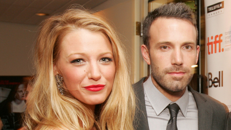 Blake Lively and Ben Affleck smiling at an avent