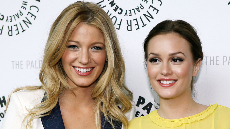 Blake Lively and Leighton Meester smiling side by side at an event