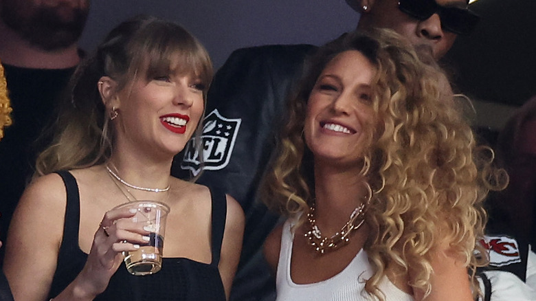 image of Taylor Swift and Blake Lively at a sporting event