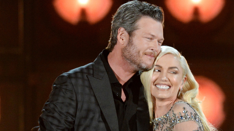 Blake Shelton hugging Gwen Stefani