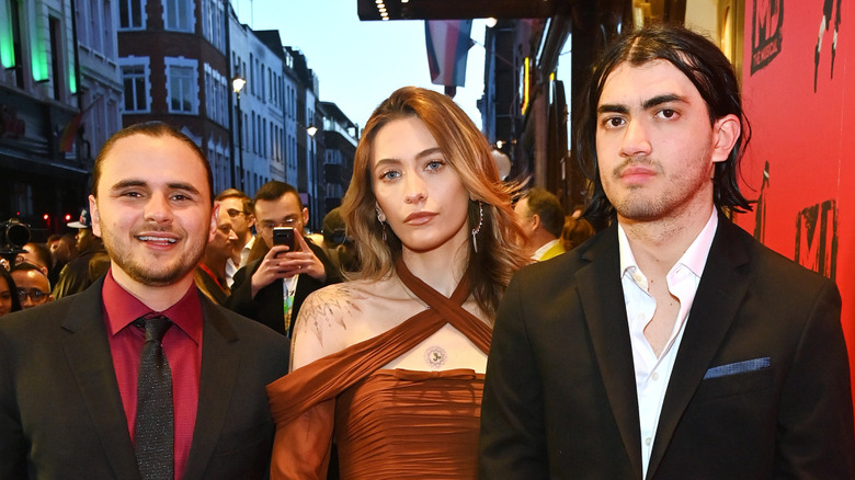 Prince, Paris, and Bigi Jackson posing at an event
