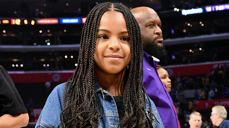 Blue Ivy smiling with braids