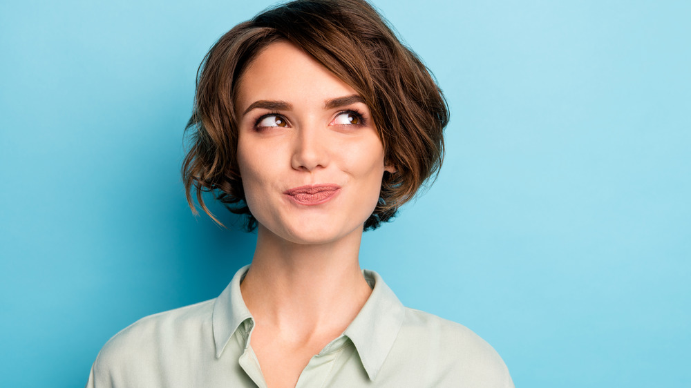 Woman smiling with bob haircut