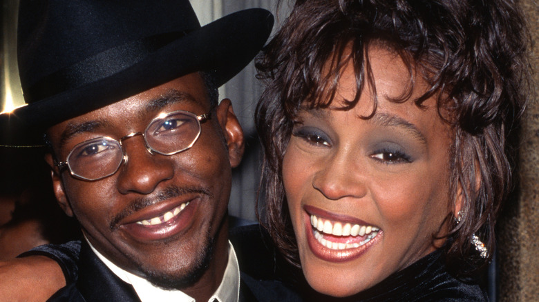 Bobby Brown and Whitney Houston smiling