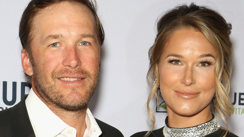 Bode Miller and Morgan Beck pose together and smile