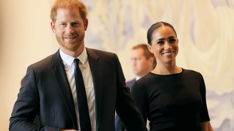 Prince Harry Meghan Markle walking in lobby UN