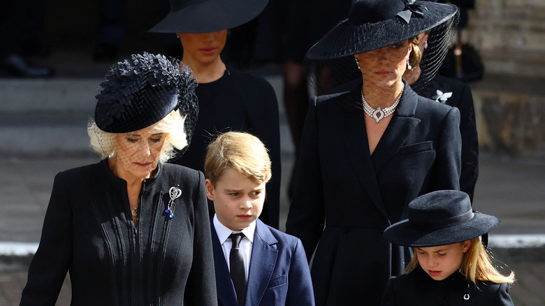Camilla Parker Bowles and Kate Middleton arriving at the funeral 