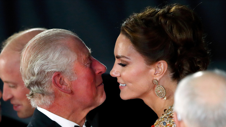 Middleton kissing Prince Charles' cheek