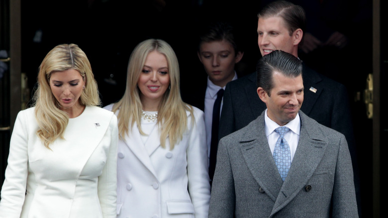 Trump siblings walking