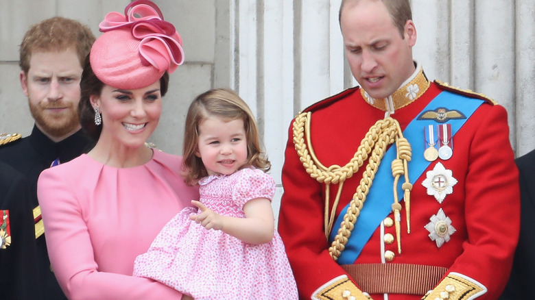 Prince Harry with Prince William, Princess Catherine, and Charlotte