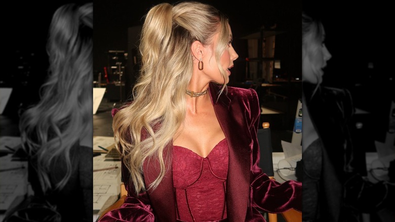 Heather Rae El Moussa facing away from the camera