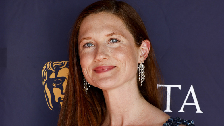 Bonnie Wright smiling on the red carpet 