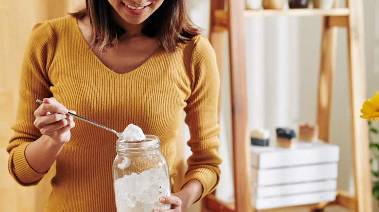 Woman holding baking soda