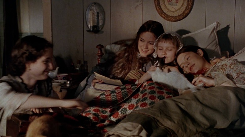 Winona Ryder, Kirsten Dunst and others in a scene from Little Women