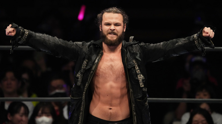 Jack Perry posing inside wrestling ring
