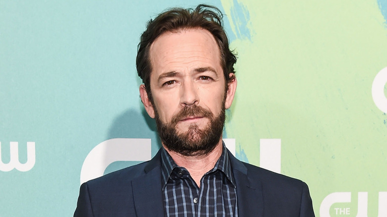 Luke Perry posing with neutral expression