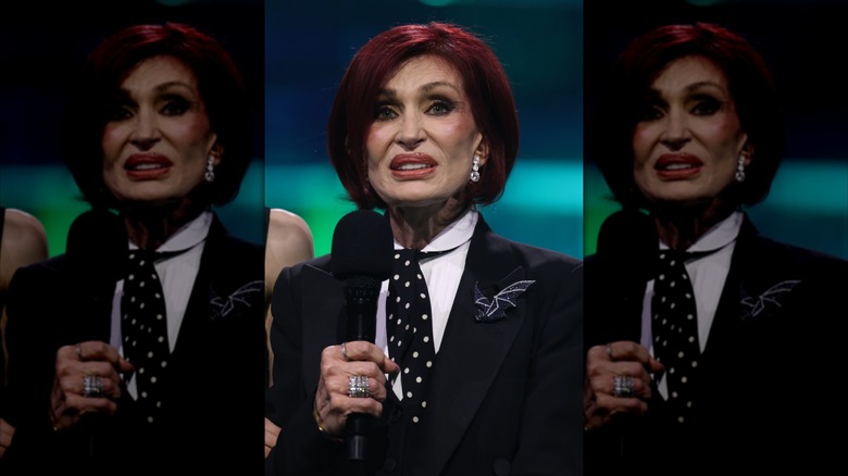 Sharon Osbourne speaking into microphone