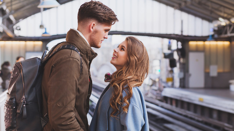 Couple at train station 