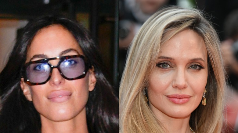 Ines de Ramon smiling while wearing shades next to Angelina Jolie who's also smirking.