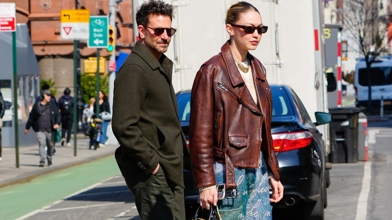 Bradley Cooper and Gigi Hadid walking