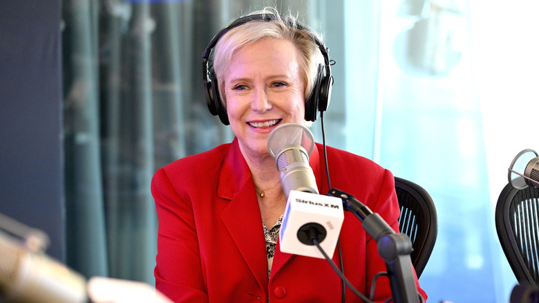 Eve Plumb with microphone