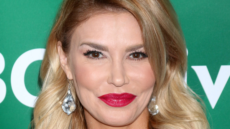 Brandi Glanville smiles