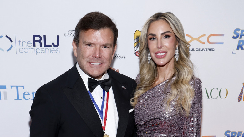 Bret and Amy Baier smiling on the red carpet