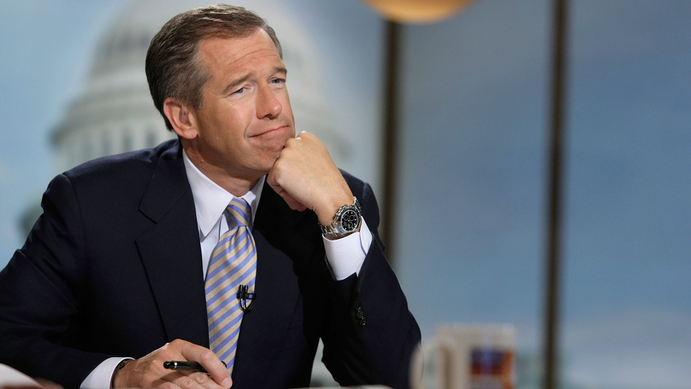 Brian Williams wearing suit on set