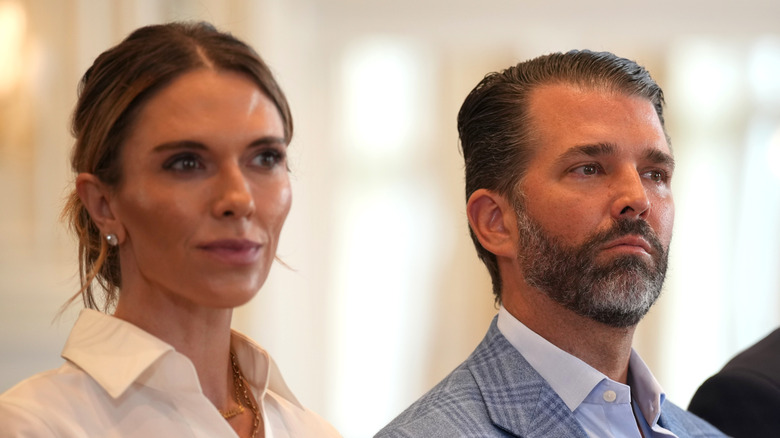 Bettina Anderson and Donald Trump Jr. staring