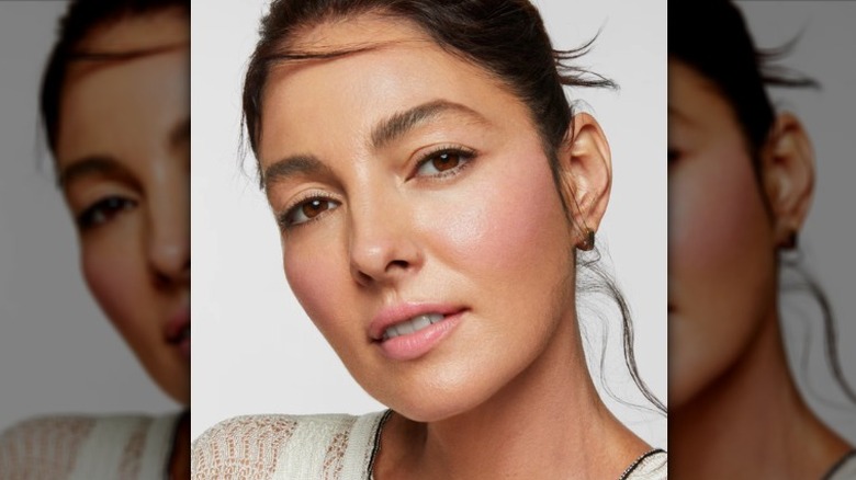 model wearing pink milk blush