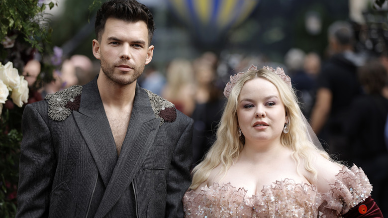Nicola Coughlan and Luke Newton posing for the cameras on the red carpet