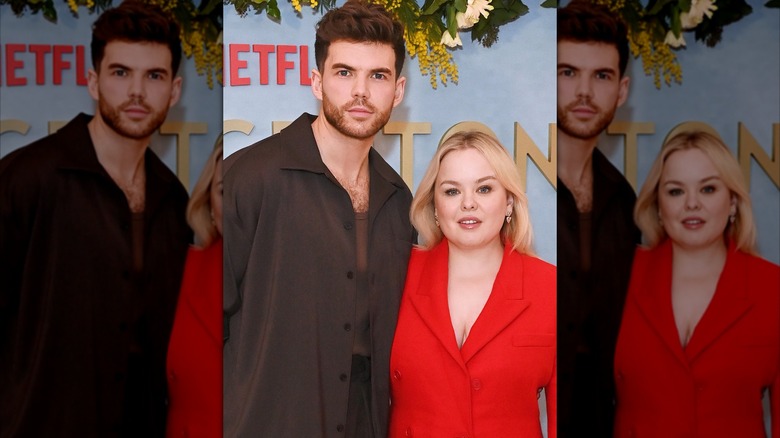 Nicola Coughlan and Luke Newton posing together for a photograph