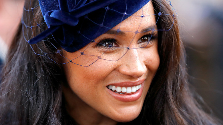 Meghan Markle smiling at event
