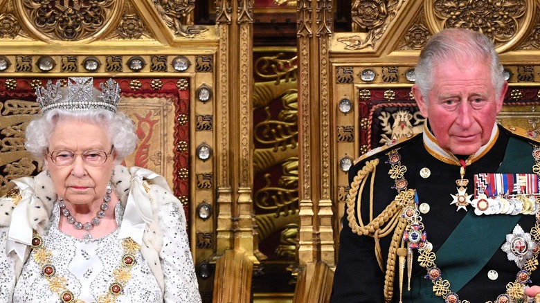 Queen Elizabeth and Prince Charles on thrones