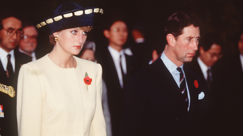 Princess Diana and Prince Charles looking incredibly glum during their South Korea tour