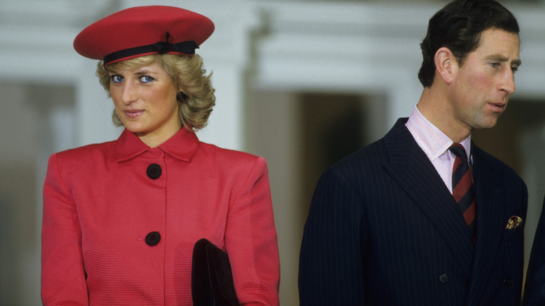 Princess Diana and Prince Charles turning away from each other