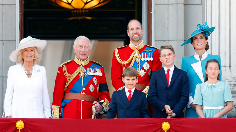 Members of the British royal family stand on the balcony of Buckingham Palace