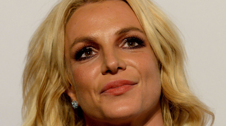 Singer Britney Spears walks the red carpet at the 2017 Pre-GRAMMY Gala And Salute to Industry Icons Honoring Debra Lee at The Beverly Hilton Hotel