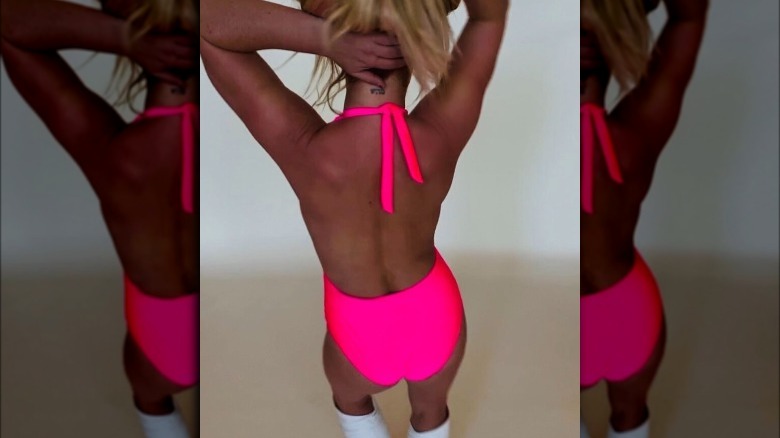 Britney Spears wearing pink bathing suit