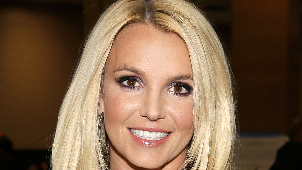Britney Spears smiles at an event
