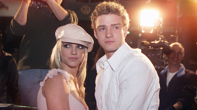 Britney Spears and Justin Timberlake looking in opposite directions