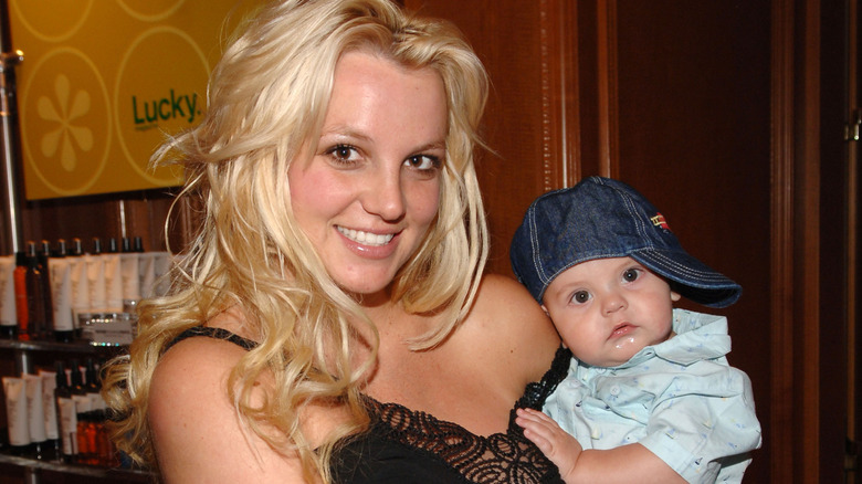 Britney Spears holding her son