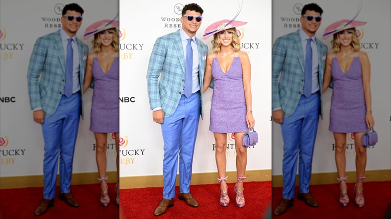 Patrick Mahomes and Brittany Mahomes posing in pastel for the Kentucky Derby