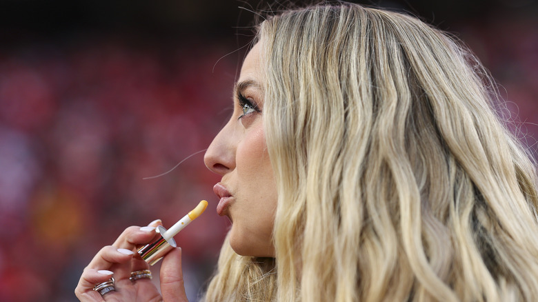 Brittany Mahomes applying makeup