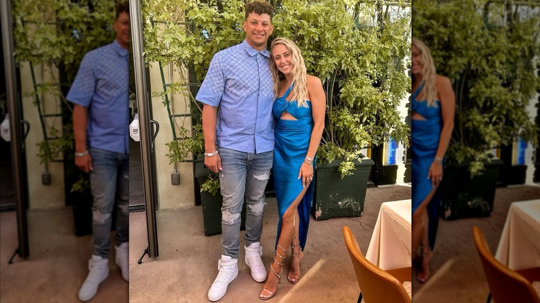 Brittany Mahomes wearing a blue dress and posing beside Patrick Mahomes