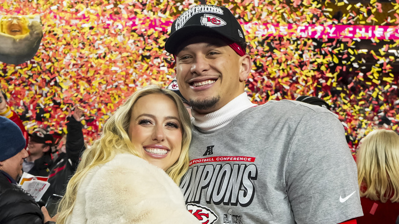 Brittany Mahomes hugs Patrick Mahomes