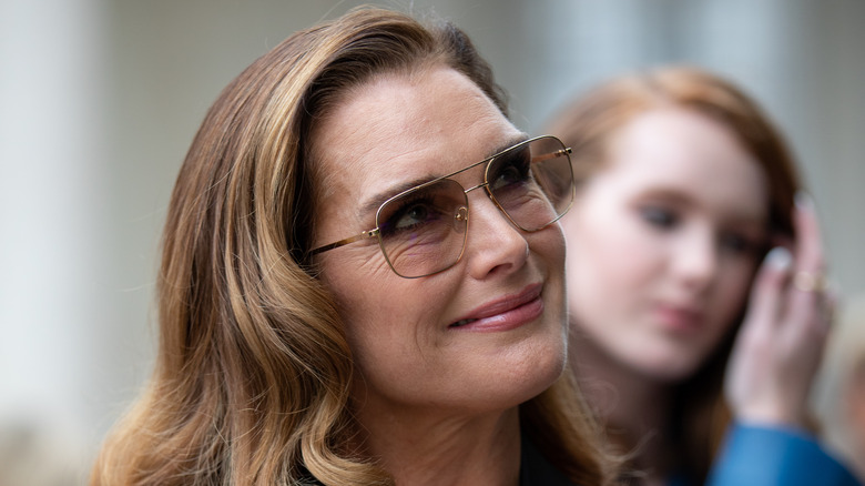 Brooke Shields in sunglasses, smiling