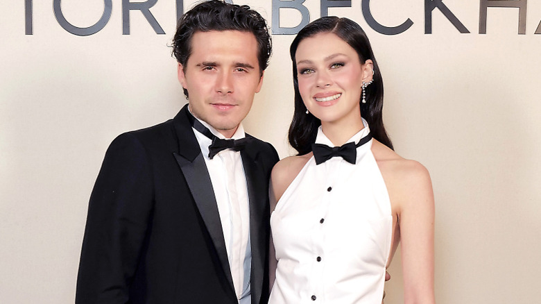 Brooklyn Beckham and Nicola Peltz smiling in September 2024