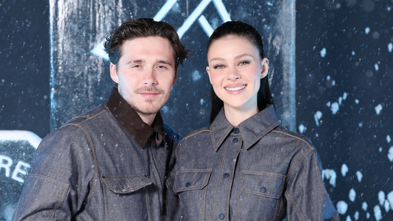 Brooklyn Beckham and Nicola Peltz smiling in March 2025